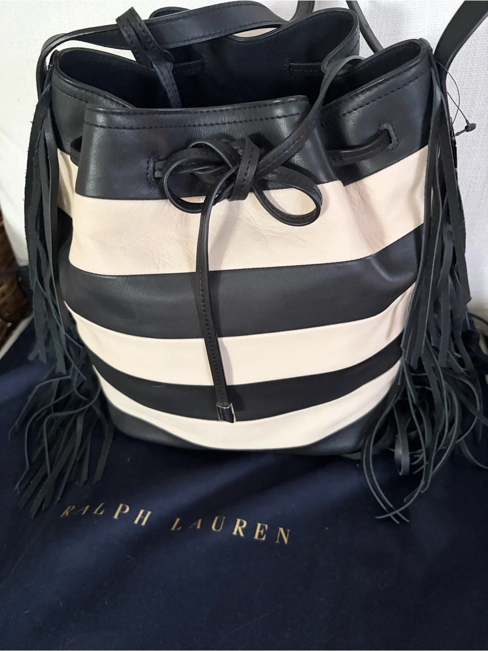 Ralph Lauren Black and cream leather bucket bag with wristlet